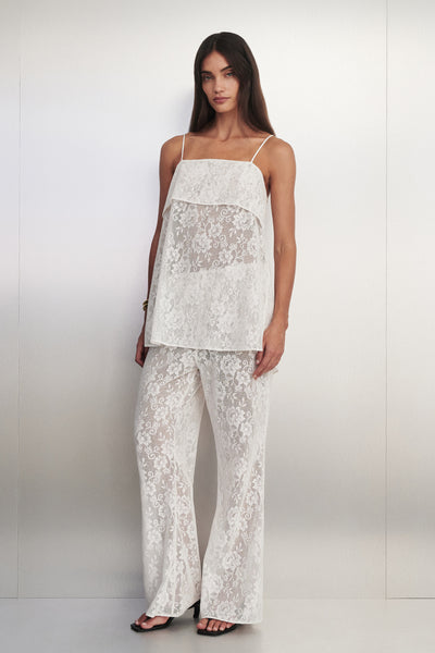 Holly wearing ANYA WHITE LACE PANT