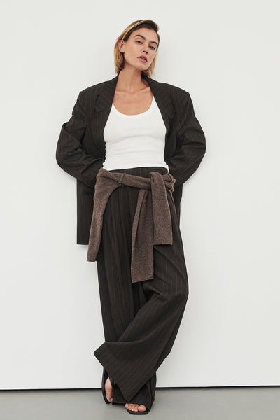 Joanna wearing SIAN PEAT CHOC TAILORED WIDE PANT