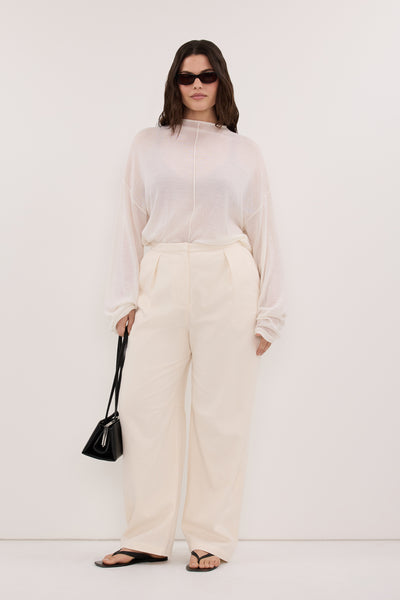 Jasmine wearing CAMILLE CREAM TWILL BARREL LEG PANT