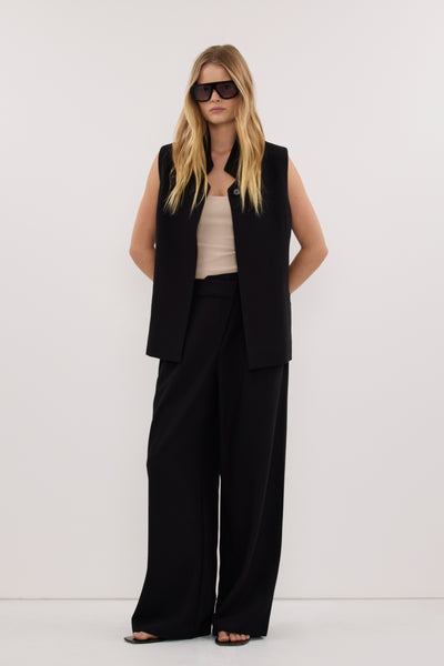 Zoe wearing VIDA BLACK ASYM WAISTBAND PANT