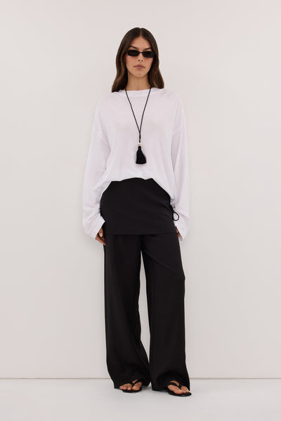 Helena  wearing CALIA BLACK BUTTON WRAP PANT