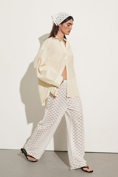 Sofia wearing RENATA WHITE LACE PANT