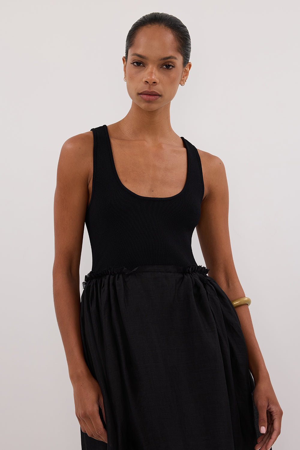 April Hybrid Knit Sleeveless Midi Dress in Black By DISSH April Hybrid Knit Sleeveless Midi Dress in Black By DISSH