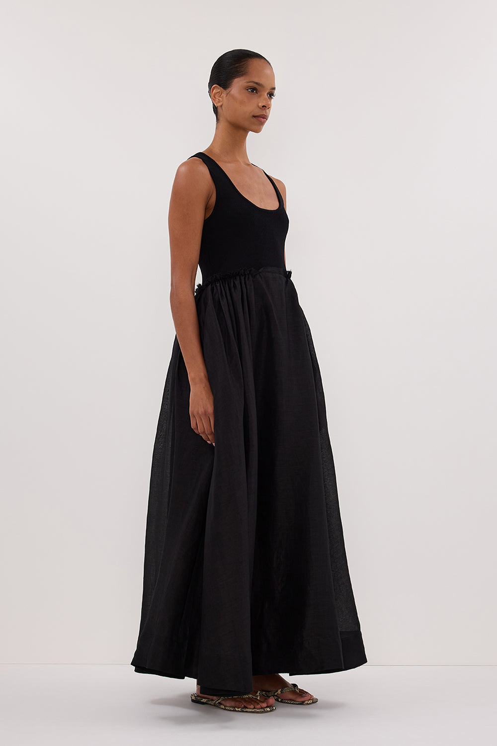 April Hybrid Knit Sleeveless Midi Dress in Black By DISSH April Hybrid Knit Sleeveless Midi Dress in Black By DISSH