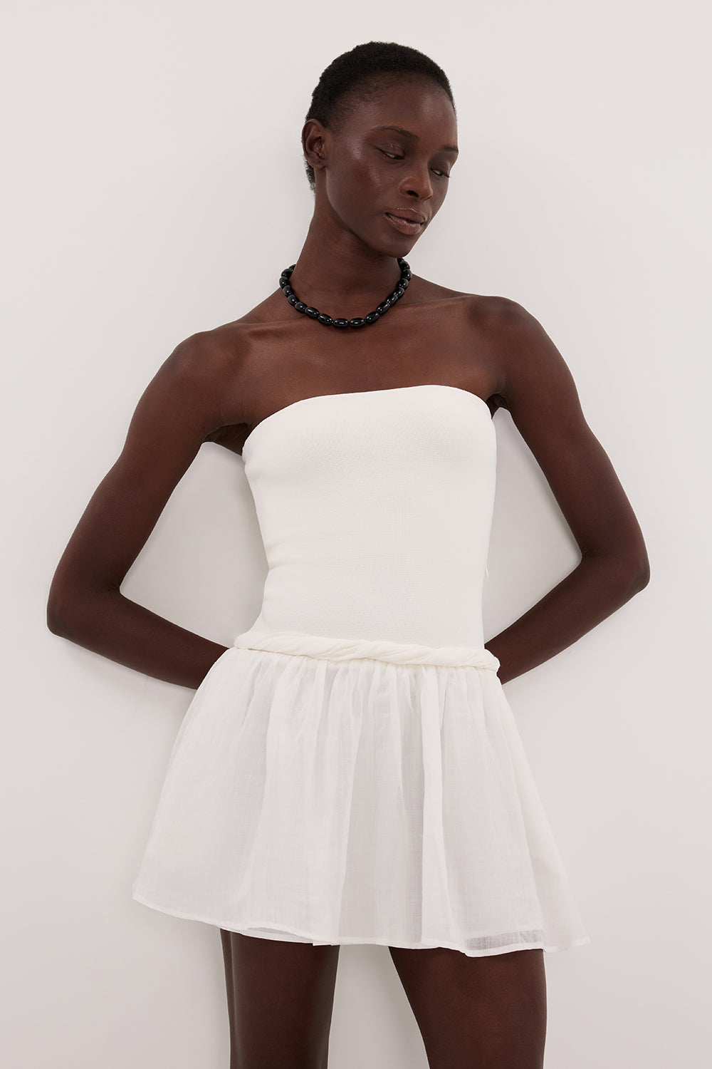 Coco Strapless Hybrid Mini Dress in White By DISSH Coco Strapless Hybrid Mini Dress in White By DISSH
