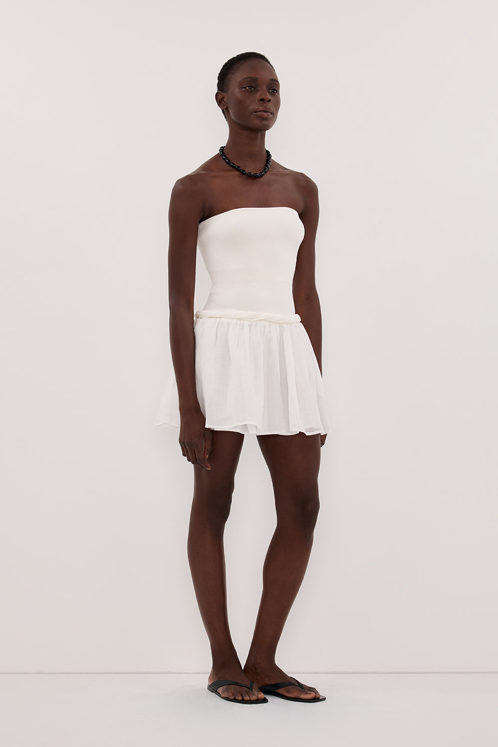 Coco Strapless Hybrid Mini Dress in White By DISSH Coco Strapless Hybrid Mini Dress in White By DISSH