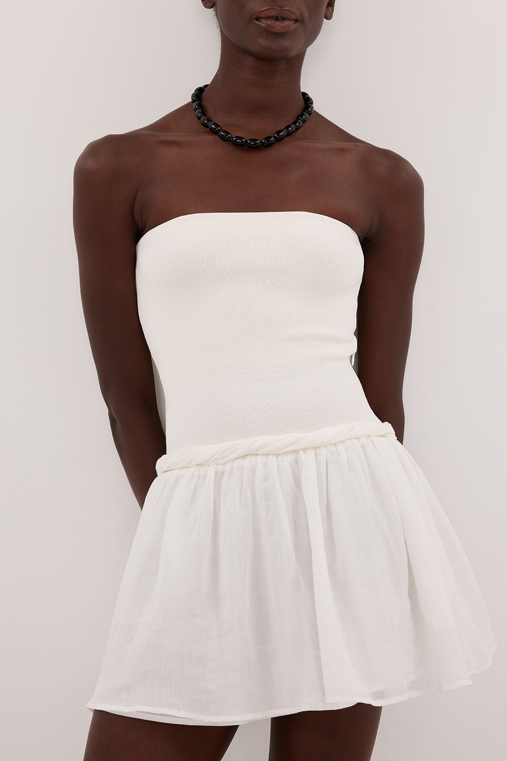 Coco Strapless Hybrid Mini Dress in White By DISSH Coco Strapless Hybrid Mini Dress in White By DISSH
