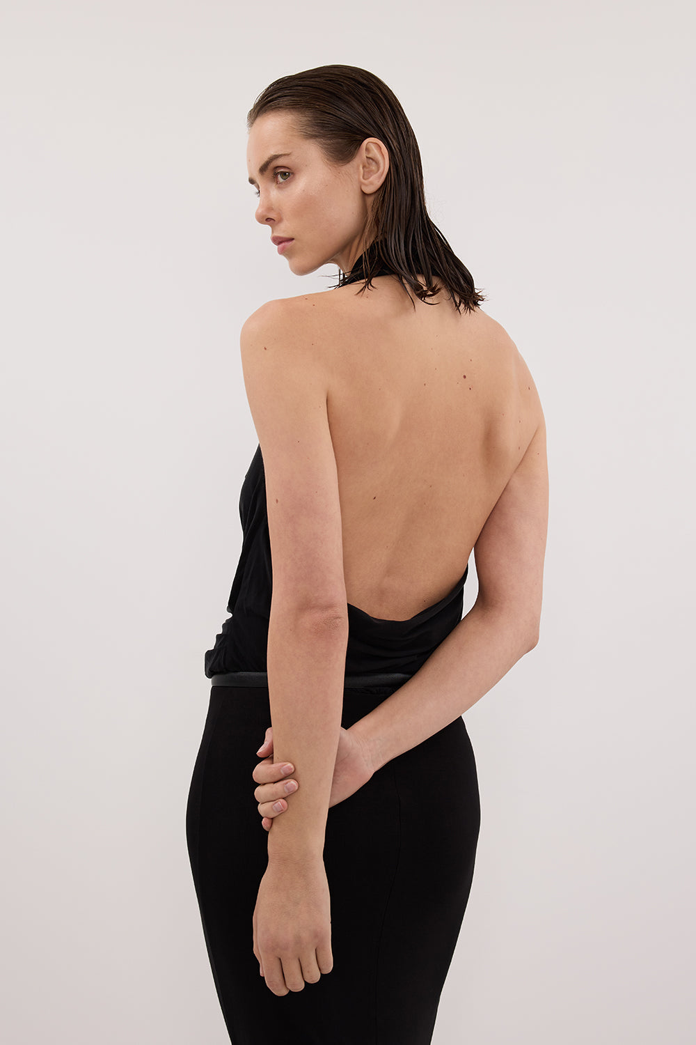 Felicity Sleeveless Halter Midi Dress in Black By DISSH Felicity Sleeveless Halter Midi Dress in Black By DISSH