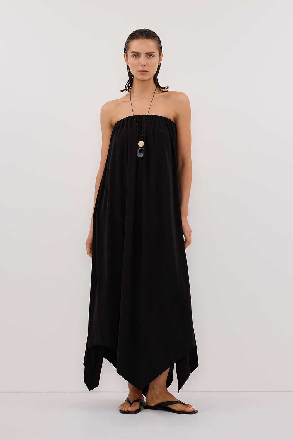 Ava Strapeless Midi Dress in Black By DISSH