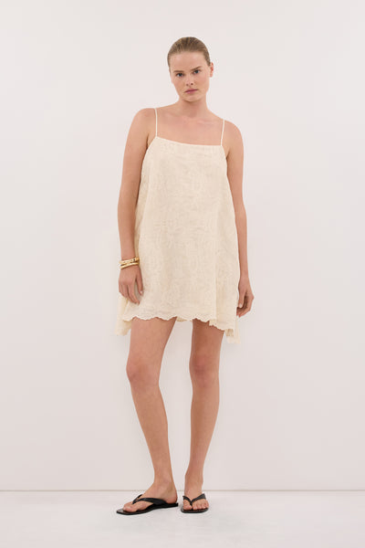 Zoe wearing CORDELIA SANDSTONE RAMIE MINI DRESS - PRE ORDER