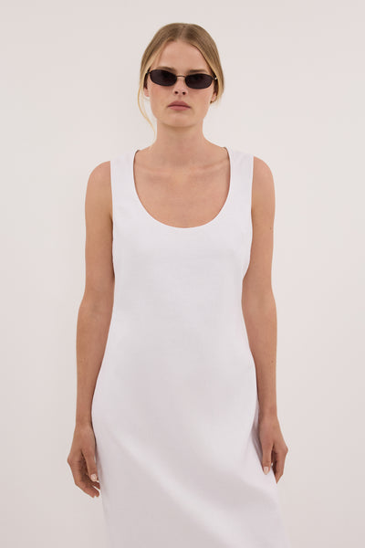 Zoe wearing AURELI WHITE LINEN MIDI DRESS