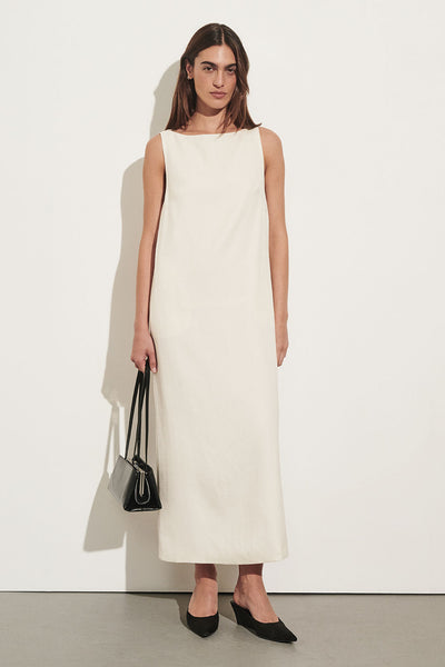 Sofia wearing RUNA IVORY BOAT NECK MIDI DRESS