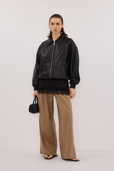 Stas wearing HUTTON BLACK LEATHER BOMBER JACKET