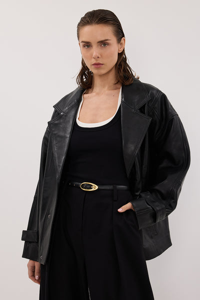 Stas wearing MARGOT BLACK OVERSIZED LEATHER JACKET