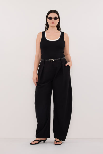 Jasmine wearing CLARA BLACK SCOOP NECK TANK TOP