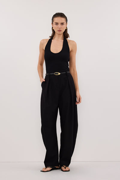 Stas wearing HARLAN BLACK KNIT HALTER TOP