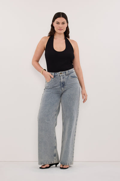 Jasmine wearing HARLAN BLACK KNIT HALTER TOP