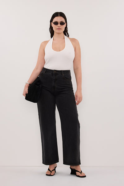 Jasmine wearing HARLAN OFF WHITE KNIT HALTER TOP