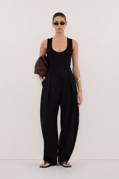 Zoe wearing YASMIN BLACK SLEEVELESS KNIT TANK