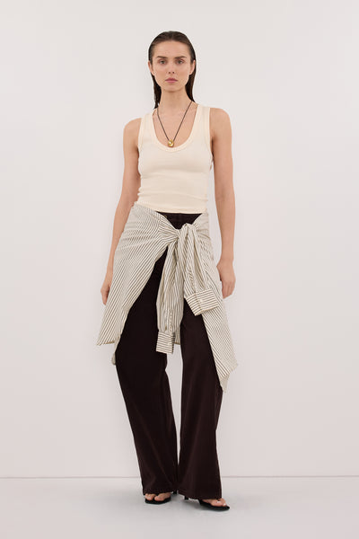 Stas wearing YASMIN SANDSTONE SLEEVELESS KNIT TANK