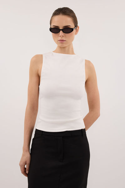 Stas wearing AMARA OFF WHITE BOAT NECK KNIT TANK