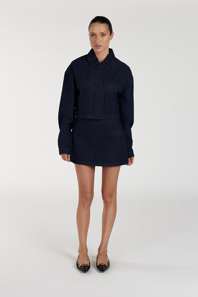 Casey wearing ALBERTA INDIGO TAILORED DENIM MINI SKIRT