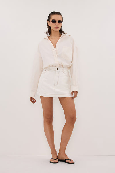Stas wearing KERA WHITE DENIM A LINE SKORT