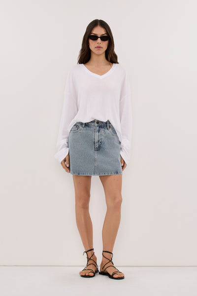Helena  wearing CARTIER LIGHT BLUE DENIM SKORT