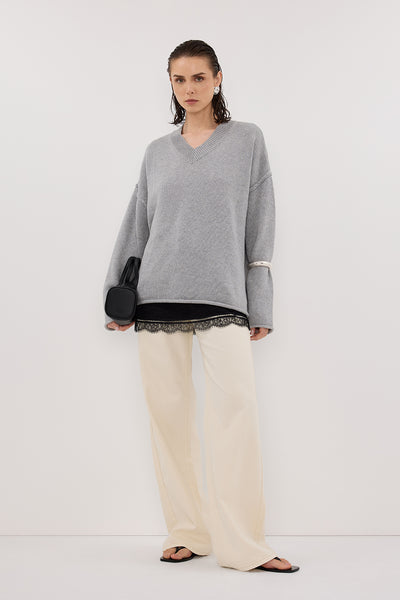 Stas wearing REAGAN 2.0 NATURAL TALL SLOUCHY JEAN