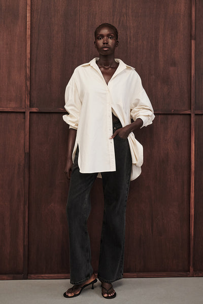 Ajok wearing REAGAN 2.0 WASHED BLACK TALL SLOUCHY JEAN