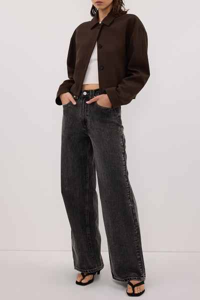 Ajok wearing REAGAN 2.0 WASHED BLACK TALL SLOUCHY JEAN