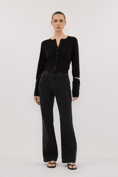 Stas wearing NOELLE BLACK RINSE BOOTLEG JEAN