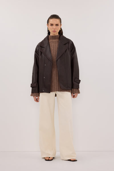 Stas wearing REAGAN 2.0 CREAM SLOUCHY JEAN