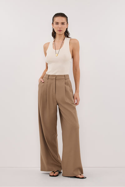 Stas wearing DEVIN CREAM RACER KNIT TANK