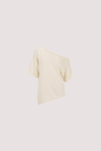 Joanna wearing RICK CREAM ASYM KNIT TOP