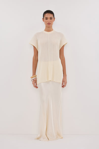 Aude wearing JADE CREAM SLEEVELESS KNIT TOP