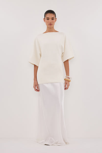 Aude wearing LIA IVORY SLEEVED KNIT TOP