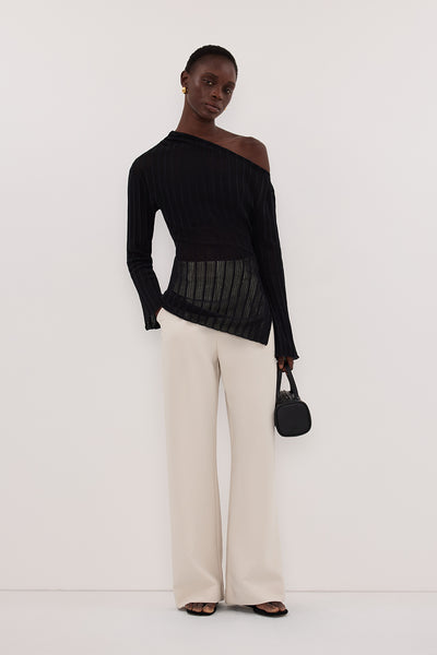 Maguette wearing BOWIE BLACK LONG SLEEVE KNIT TOP