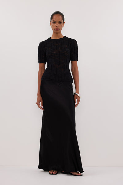 Kristen wearing CIA BLACK CAP SLEEVE KNIT TEE