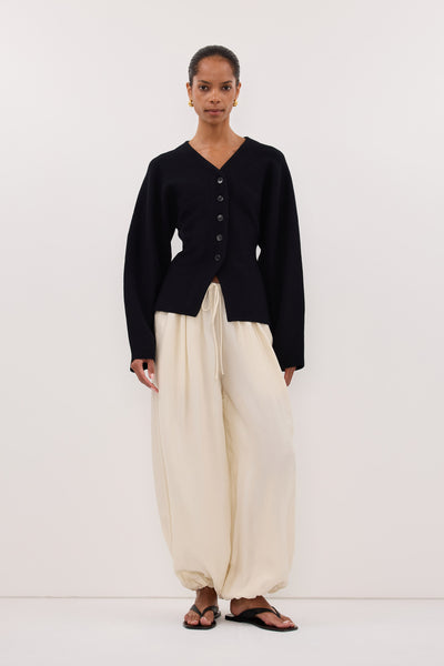 Kristen wearing ETHEL BLACK V NECK CARDIGAN