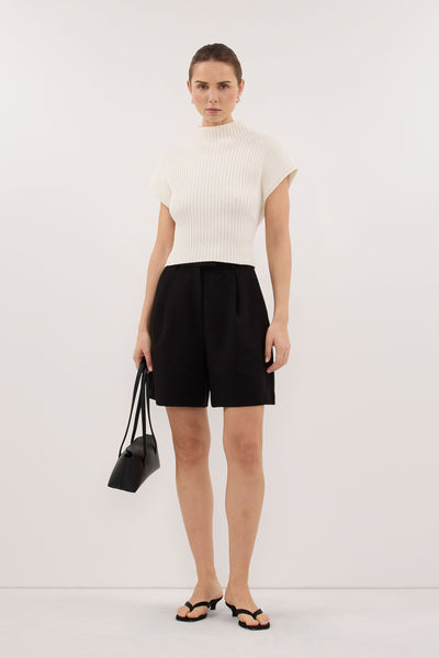 Stas wearing DELLA OFF WHITE KNIT TOP