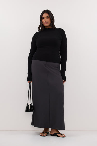Shanaya wearing ANGEL BLACK RAGLAN FUNNEL NECK TOP