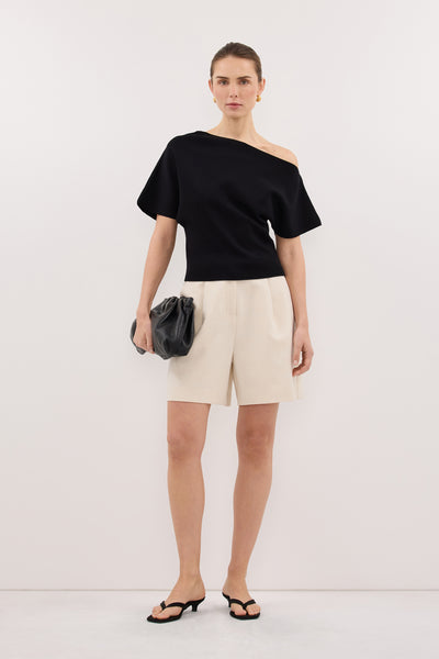 Stas wearing SCARLETT BLACK ASYM KNIT TOP