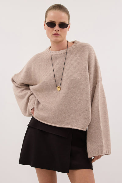 Zoe wearing ADELINE OAT MARLE CREW KNIT JUMPER