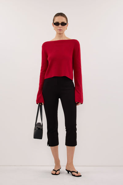 Stas wearing ILLARIA BURNT RED WIDE SLEEVE KNIT TOP
