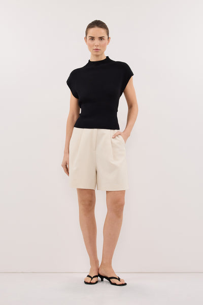 Stas wearing OLINNA BLACK TEXTURED KNIT TOP