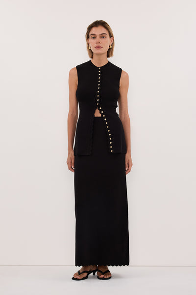 Joanna wearing ZOE BLACK SCALLOPED KNIT MIDI SKIRT