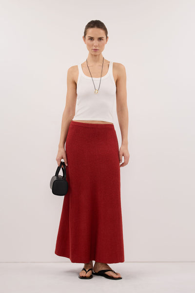 Stas wearing HARRIET BURNT RED KNIT MAXI SKIRT