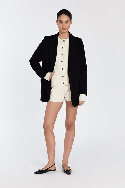 Adrienne wearing AXEL CREAM CASHMERE BLEND BOXER SHORT
