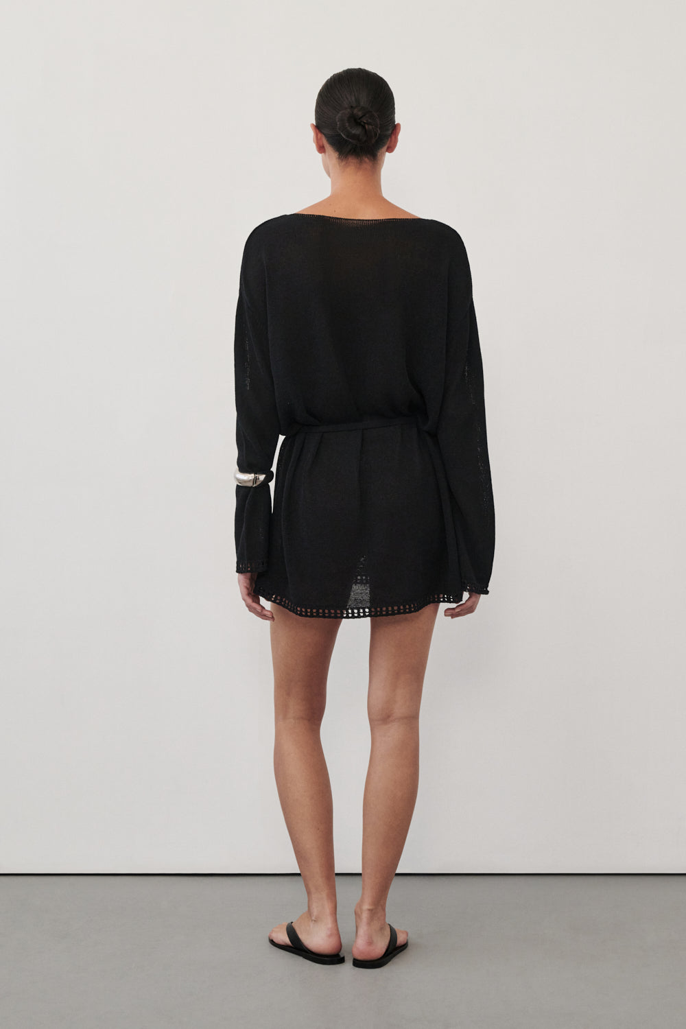 Tari Knit Long Sleeve Mini Dress in Black By DISSH Tari Knit Long Sleeve Mini Dress in Black By DISSH